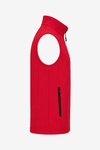 Gilet sans manches rouge, vue de profil, poche zippée latérale et bordure col montant