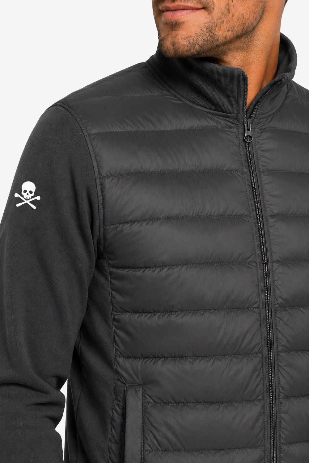 Détail veste de golf gris foncé, piqûres matelassées et zip central