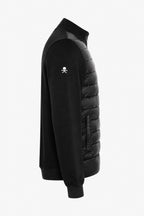 Veste de golf pour homme noire, coupe latérale avec logo au niveau de la manche.