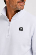Pull de golf homme 1/4 zippé blanc, demi-zip et petit écusson sur la poitrine