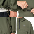 Détails veste coupe-vent kaki technique pour golf, poches zippées, badge brodé, serrage bas