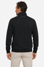 Sweat homme noir à demi-zip 1/4, col montant, vue arrière sur la couture bas.