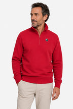 Haut sweat homme rouge 1/4 zip, col montant, écusson sur la poitrine